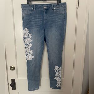 Lane Bryant light wash skinny jeans with crochet detailing